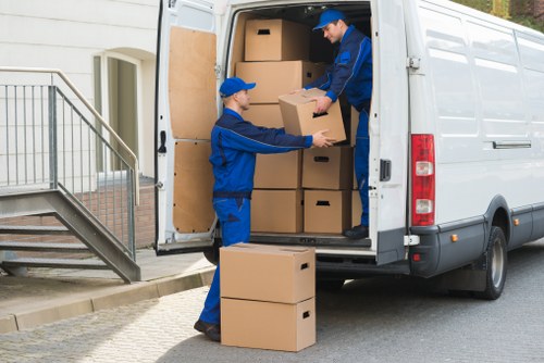 Moving large furniture items safely through a Twickenham home