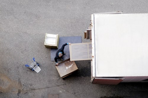 Local moving team preparing boxes and rooms for unpacking in Twickenham