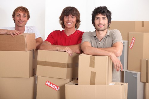 Careful loading of furniture for urgent removals in a Twickenham property