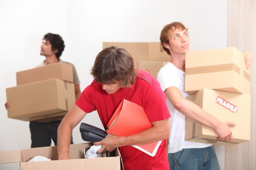 Packed boxes and furniture ready for a home relocation