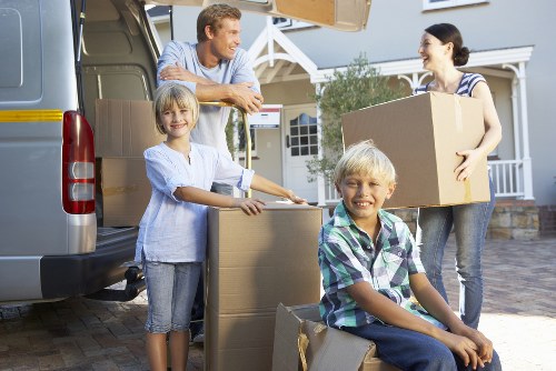Packed moving boxes and furniture prepared for removal in Twickenham