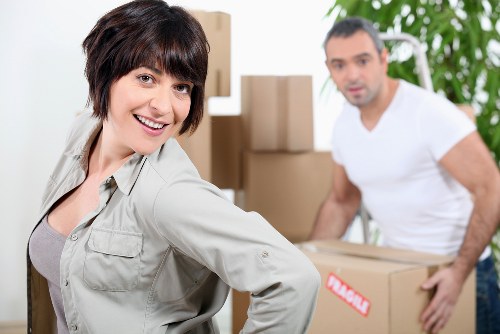 Loading household items into a removal van
